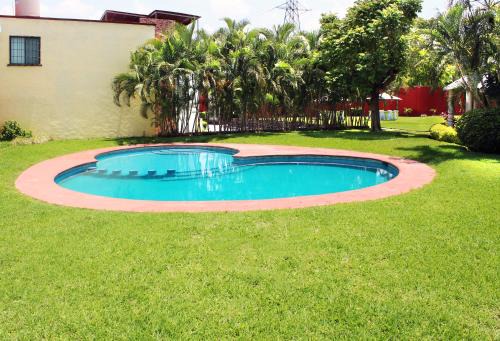 Tezoyuca House | Casa Palmera con Aire acondicionado Alberca Wifi cocina y TV