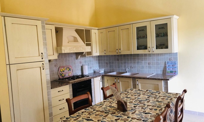 Porto Pino House | Casa Vacanze a Pochi Passi Dalla Bellissima Spiaggia di Portopino