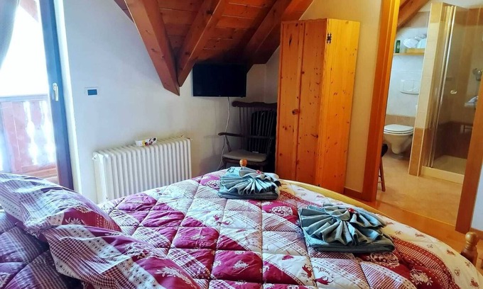 Tarvisio Apartment | CASETTA CHEY -ideal for couples and families-private parking-breakfast included