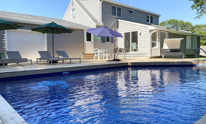 Hampton Bays House | Centrally located, newly renovated and furnished 4 bed/4 bath + heated pool
