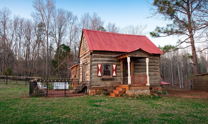 Pittsboro House | Century old log cabin on 62 acre estate