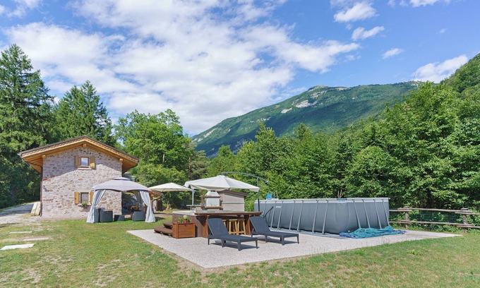 San Lorenzo in Banale Ski Chalet | Chalet 'Camillo' with Mountain View, Private Pool and Private Garden