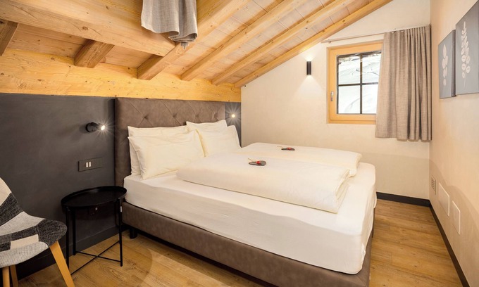 Livigno Ski Chalet | Chalet 'River Villa Genf Spa - Relax' with Mountain View and Shared Garden