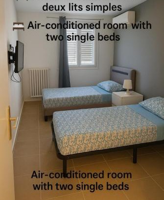 Le Ray Bed & Breakfast | Chambre privative rénové 2024, climatisation, tramway sur place , 12 min centre, 16 min plage, aperçu latéral mer, 2 wc avec 2 salle de bain, private room renovated 2024, air-conditioned , tram on spot, 2 toilets and 2 bathrooms
