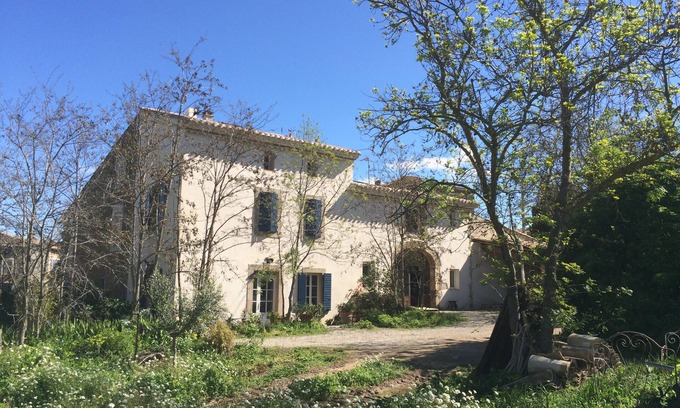 Ornaisons Cottage | Character building on large wooded grounds with private garden.