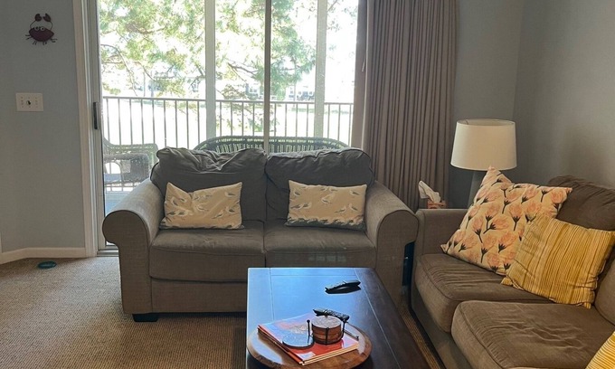 Sea Trail Condo | Charming 2-bedroom condo with Wi-Fi in tranquil Sunset Beach on Golf Course.