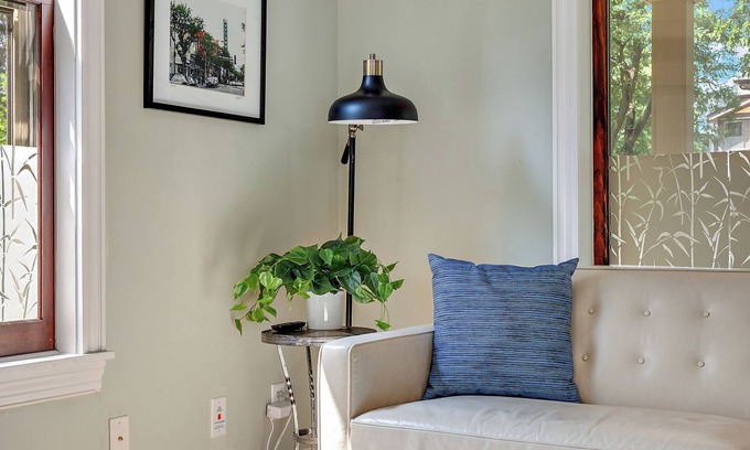 Uptown House | "Charming 4BR Home Steps to Lake of the Isles with Fenced Yard & Deck"