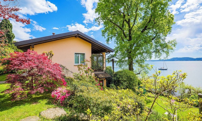 Sasso Moro Villa | Charming 5-room house with approx. 6,000 m² lakeside plot