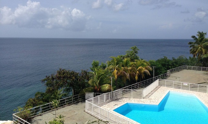 Schoelcher Apartment | Charming apartment, facing the Caribbean Sea with pool and beach.
