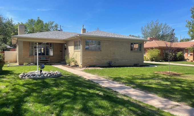 Cheyenne House | Charming brick home in The Avenues just a few blocks to Frontier Park.