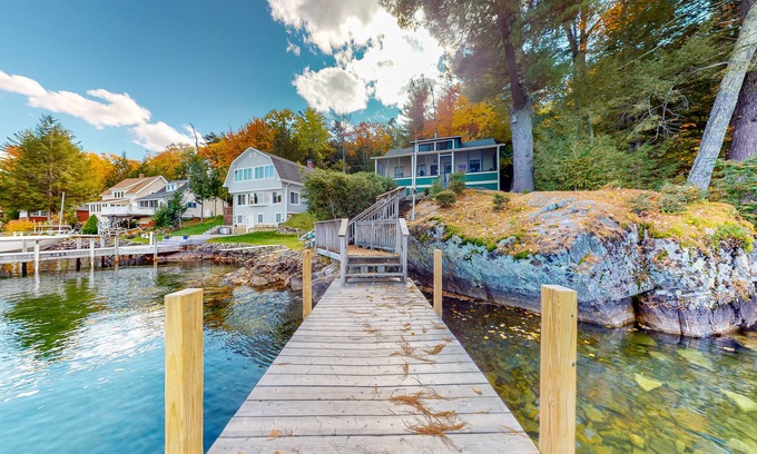 West Alton Cottage | Charming dog-friendly lakefront cottage with private dock & community beach