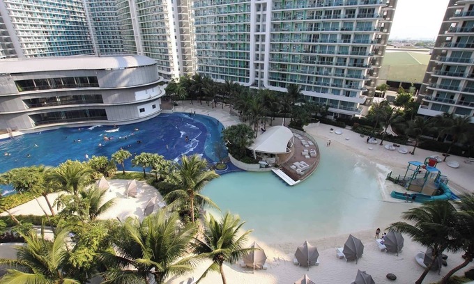 Don Bosco Resort | Charming family-sized condo at Azure Urban Resort with a grand wave pool!