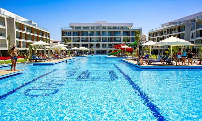 Trikomo Apartment | Charming Flat Close to the Beach with Shared Pool and Balcony with Pool View in Iskele, Cyprus