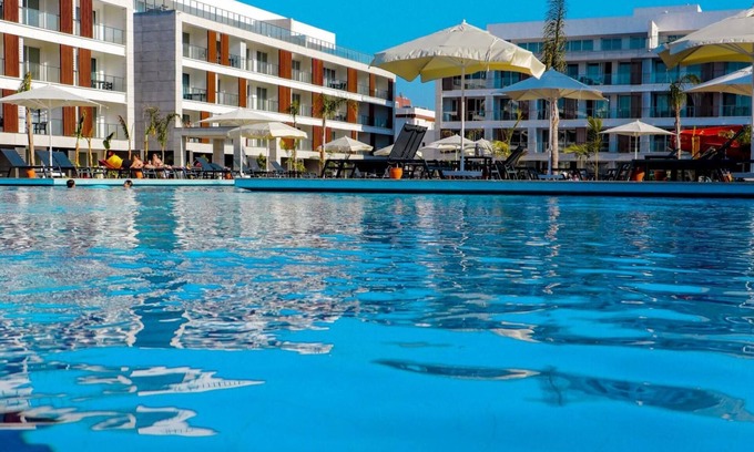Trikomo Apartment | Charming Flat Close to the Beach with Shared Pool and Balcony with Pool View in Iskele, Cyprus