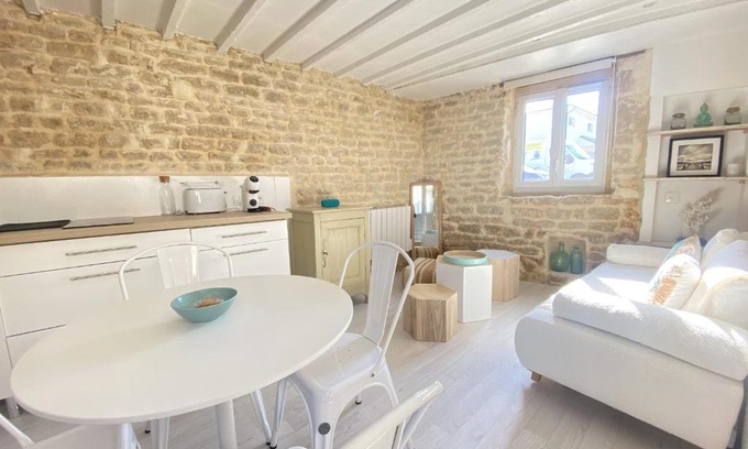 Luc-sur-Mer House | Charming little house with exposed stonework