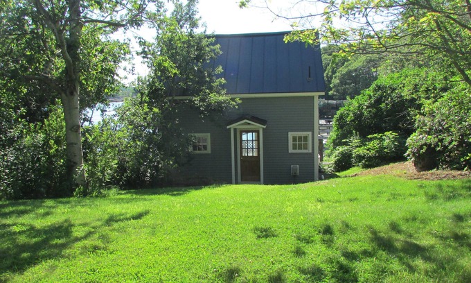 Sebascodegan Island Cottage | Charming Maine cottage overlooking the working waterfront.