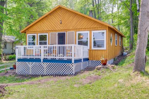 Herron House | Charming Michigan Cottage with Sunroom and Lake Access