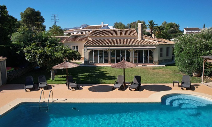 Tarraula Villa | Charming Villa on one level with large pool, lawns, and tennis court