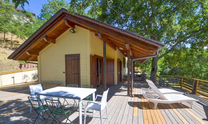Pieve Santo Stefano House | Charming wooden house, situated on a hill, between Florence and San Marino.