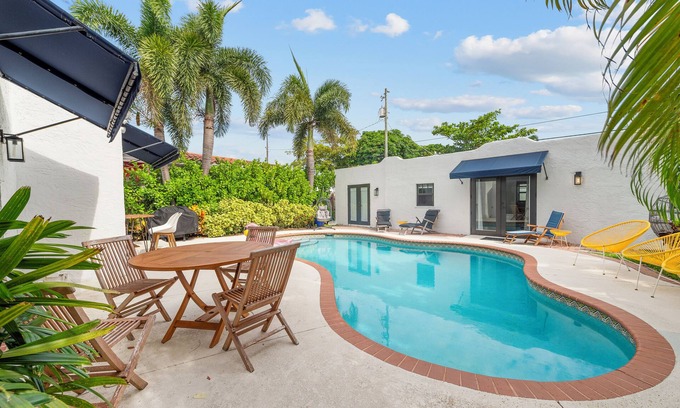 Old Northwood House | Chic 4BR retreat with private pool and modern amenities. Detached guest house includes queen bed, full bath, and kitchen. Minutes from downtown West Palm Beach, Palm Beach Island, Northwood Village, and Palm Beach Outlets.