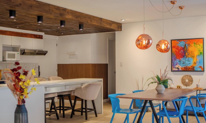 Zona 4 Apartment | Chic and Modern 9th floor 2B/2B Apt in Downtown