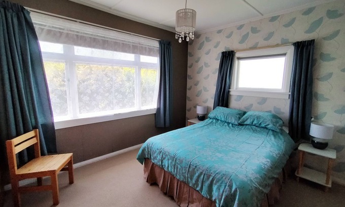 Otaki House | Classic Kiwi Bach at Otaki Beach. Pet and Family Friendly!