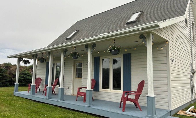 Souris Cottage | Close to Beach and Town of Souris. Quaint cottage with lovely log cabin feel.