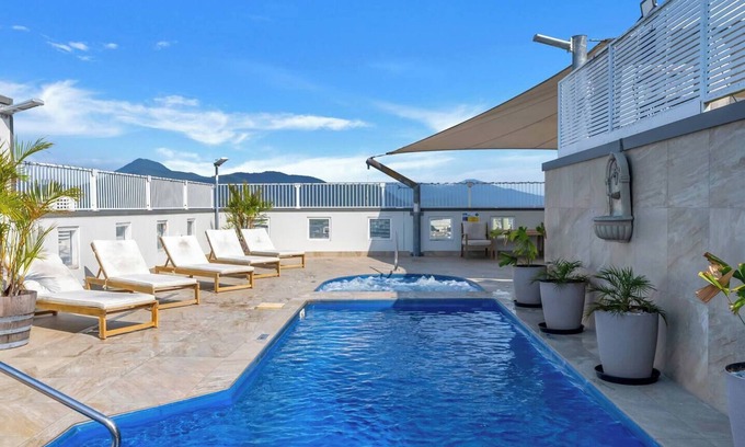 Cairns Central Business District Apartment | Coastal Chic in Heart of Cairns with Rooftop Pool
