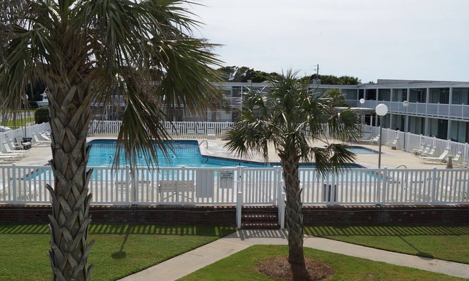 Atlantic Beach Apartment | Come for the beach, stay for the memories. Enjoy free beach access & huge pool!