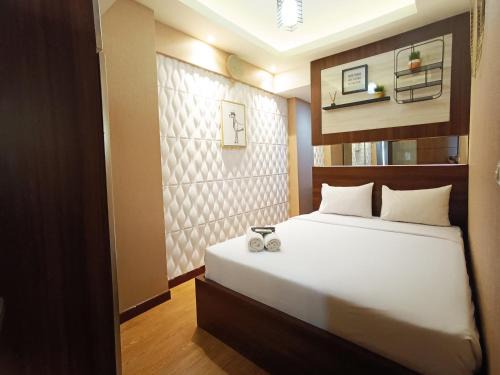 Panakkukang Apartment | Comfort and Strategic 2BR Apartment at Vida View Makassar By Travelio
