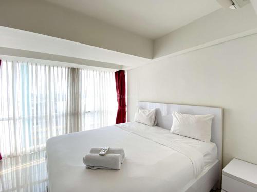 Jatinegara Apartment | Comfort Stay and Homey 2BR Apartment at H Residence By Travelio