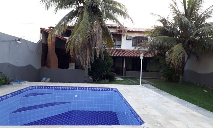 Camboinhas House | Comfortable beach house, large balcony with barbecue near the beach