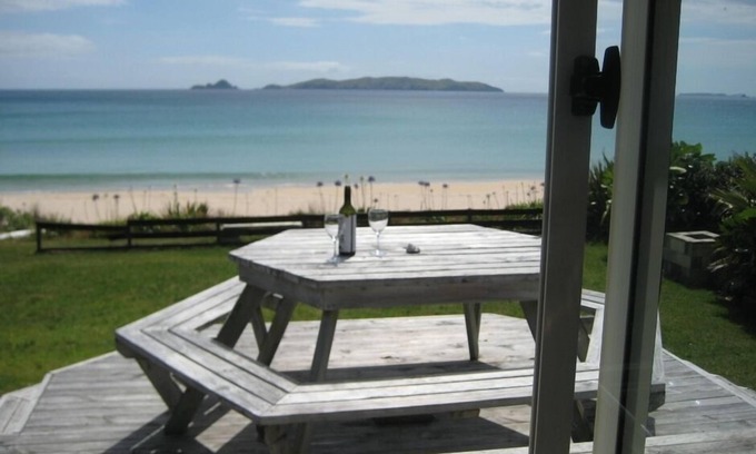 Taupo Bay House | Comfortable beachfront house at Taupo Bay.