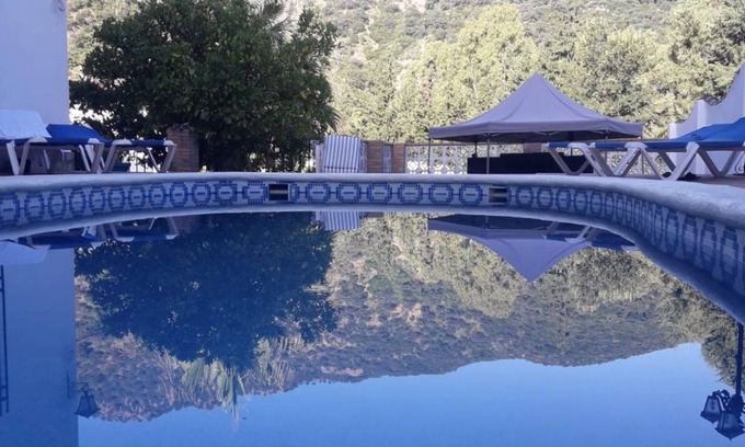 Benamahoma Villa | Comfortable village house with swimming pool and walled garden
