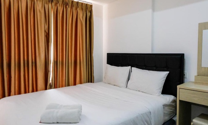 Pagedangan Apartment | Comfy 1BR Casa De Parco Apartment By Travelio