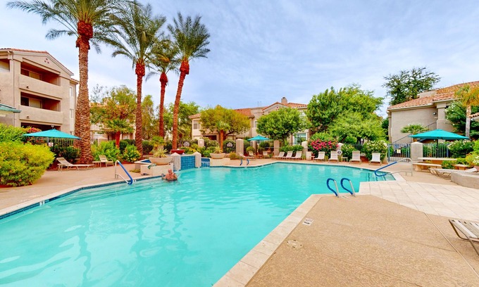 Portofino Condo | Condo with on-site pool, clubhouse, movie theater, & pedestrian paths