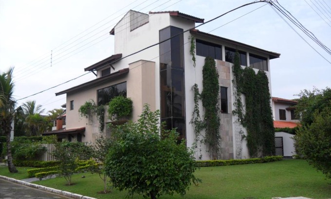 Condominio Residencial Bounganvillee House | condomínio frente a praia