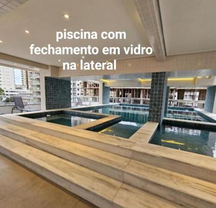 Caicara Apartment | condominio clube com piscina climatizada com fechamento em vidro - Vila Caiçara - Praia Grande 4 adultos e 1 criança até 12 anos