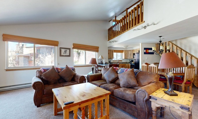 Four O'Clock Condo | Conveniently located condo with fireplace & shared hot tub