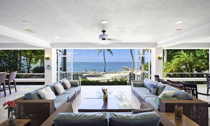 Rum Point House | Cos Kai: Harmonious Villa on Sandy Beach with Stunning Blue Views