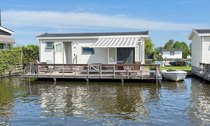 Municipality of Stichtse Vecht Boat Rental | Cosy chalet with jetty
