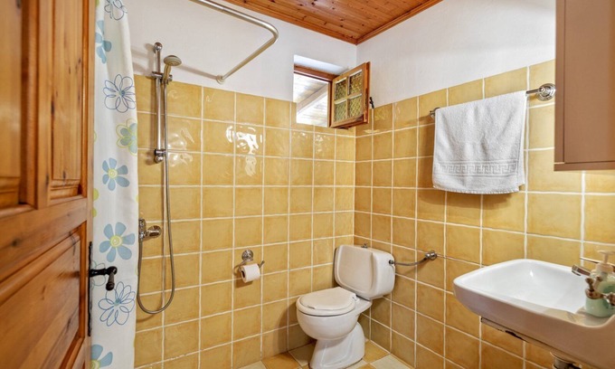 Vasilikos Cottage | Cosy cottage with large veranda and garden with hammock near the beach.