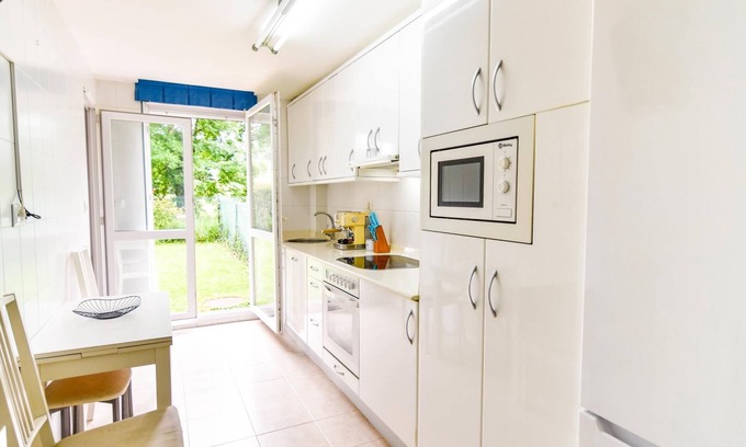 La Helguera Apartment | Cosy flat with pool and garden near Cabarceno