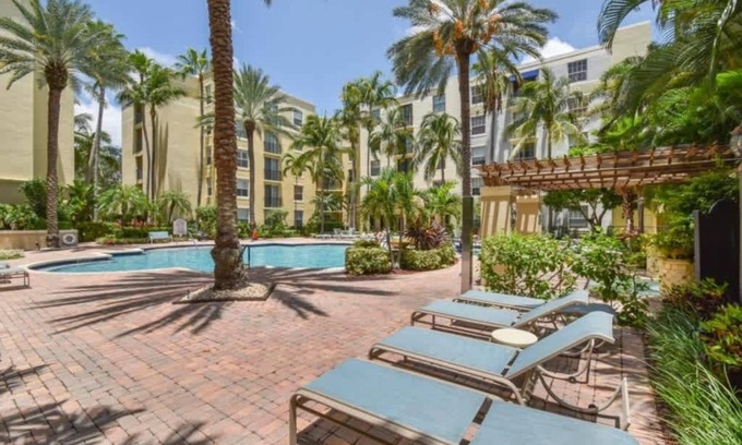 Downtown West Palm Beach Condo | Courtyard Oasis - Drift into Downtown Comfort with Pool Access