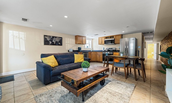 Columbia Heights House | Cozy 2 bedroom/1.5 bathroom English basement townhome. Spacious, safe, and family-friendly with open kitchen, dining area, and crib. Easy access to shops, restaurants, and DC attractions.