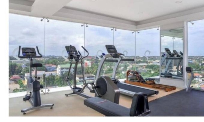 North Ridge House | Cozy 2-bedroom penthouse apartment in heart of Accra with WiFi, AC, fitness room