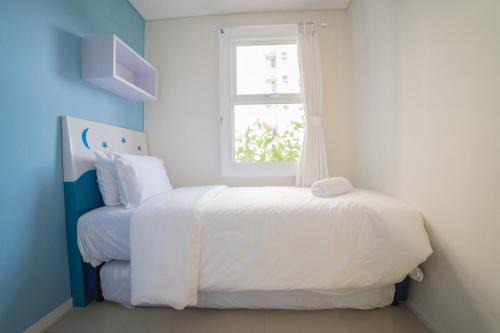 Hegarmanah Apartment | Cozy 2BR Apartment at Parahyangan Residence with Direct Access to Swimming Pool By Travelio