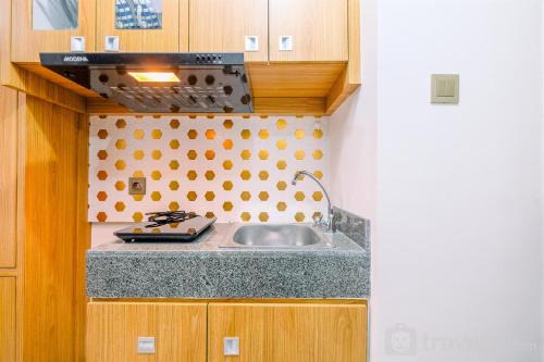 Depok Apartment | Cozy and Homey Studio Room Transpark Cibubur Apartment By Travelio