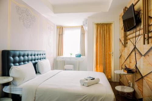 Ciputat Apartment | Cozy and Simply Look Studio Room Baileys Apartment By Travelio