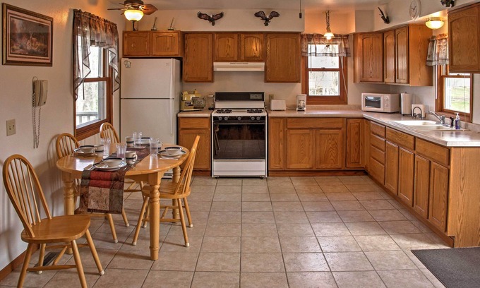 Balsam Lake Cottage | Cozy Balsam Lake Home: Deck, Private Dock + Kayaks